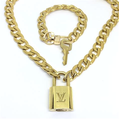 louis vuitton gold chain lock necklace|Louis Vuitton onyx necklace.